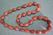 Бусы каменные, янтарного цвета. Длина 55 см. Женское украшение. Бусы каменные, янтарного цвета. Длина 55 см. Женское украшение.