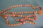 Бусы каменные. Шарики и граненые, желто-оранжевые. Длина 120 см. Женское украшение. Бусы каменные. Шарики и граненые, желто-оранжевые. Длина 120 см. Женское украшение.