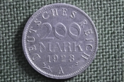 Монета 200 марок 1923 года. Веймар, Веймарская Республика. Германия. Монета 200 марок 1923 года. Веймар, Веймарская Республика. Германия.