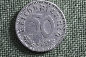 Монета 50 рейхспфеннигов, пфеннигов 1940 года A. Рейх. Германия. Монета 50 рейхспфеннигов, пфеннигов 1940 года A. Рейх. Германия.