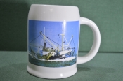 Кружка пивная фарфоровая на 0,5 литра. Рыболовецкое судно, траулер. Рыбак. Фарфор, Германия. Кружка пивная фарфоровая на 0,5 литра. Рыболовецкое судно, траулер. Рыбак. Фарфор, Германия.