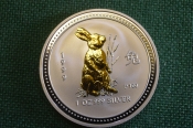 Монета 1 доллар 1999 год серебряная 1 унция. Позолота. Кролик лунар. Серебро 999 проба. Австралия Монета 1 доллар 1999 год серебряная 1 унция. Позолота. Кролик лунар. Серебро 999 проба. Австралия