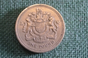 Монета 1 фунт 1983 год. One pound. Королевский герб. Елизавета II, Великобритания. Монета 1 фунт 1983 год. One pound. Королевский герб. Елизавета II, Великобритания.