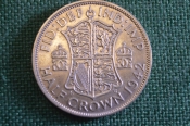 Монета 1/2 кроны 1942 год. Half crown. Серебро. Георг VI, Великобритания. Монета 1/2 кроны 1942 год. Half crown. Серебро. Георг VI, Великобритания.