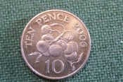Монета 10 пенсов 2006 года. Ten pence. Помидоры, ягоды. Гернси, Guernsey. Елизавета II. Монета 10 пенсов 2006 года. Ten pence. Помидоры, ягоды. Гернси, Guernsey. Елизавета II.